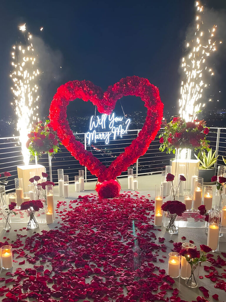 Fireworks Proposal with Red Rose Heart Arch