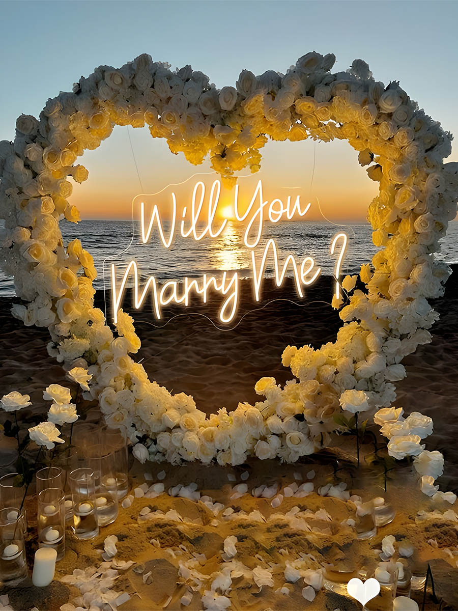 Sunset Beach Proposal with Cream Flower Heart Arch