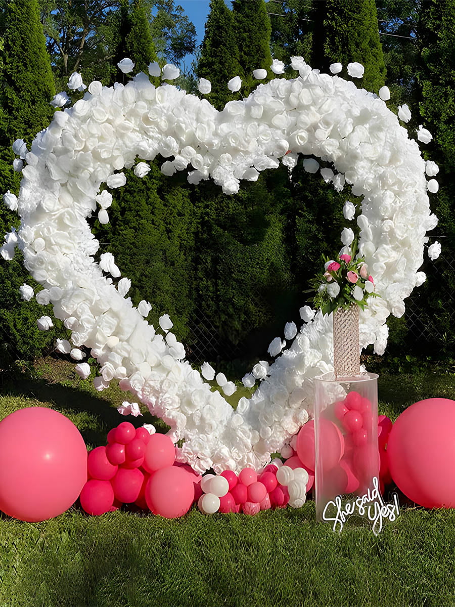 Garden Proposal with White Heart and Pink Balloons