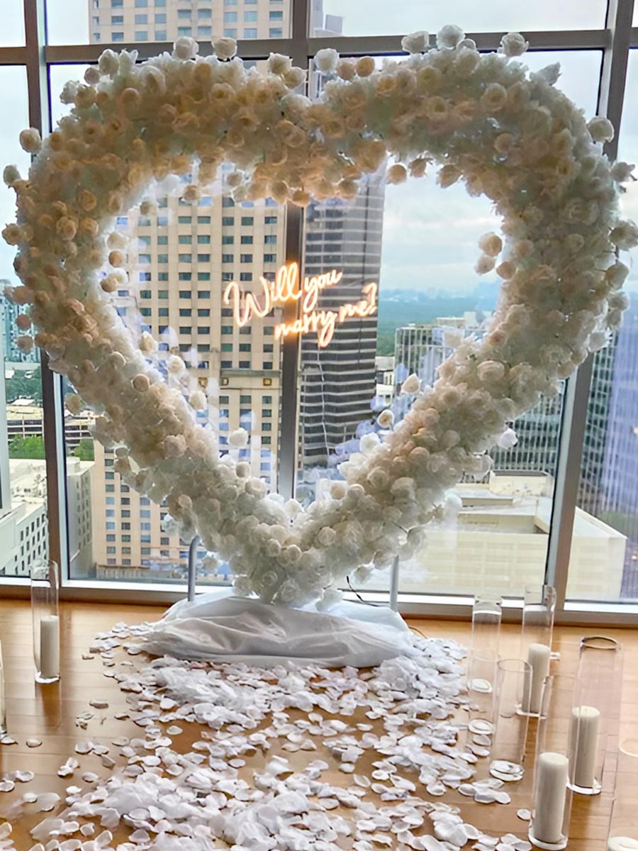 Elegant White Proposal Heart Arch with City View