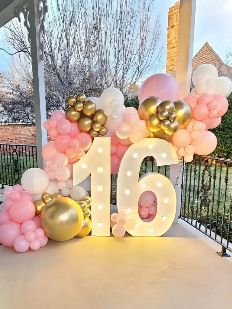 Balcony Sweet 16 Party Decorations with Balloon Garland