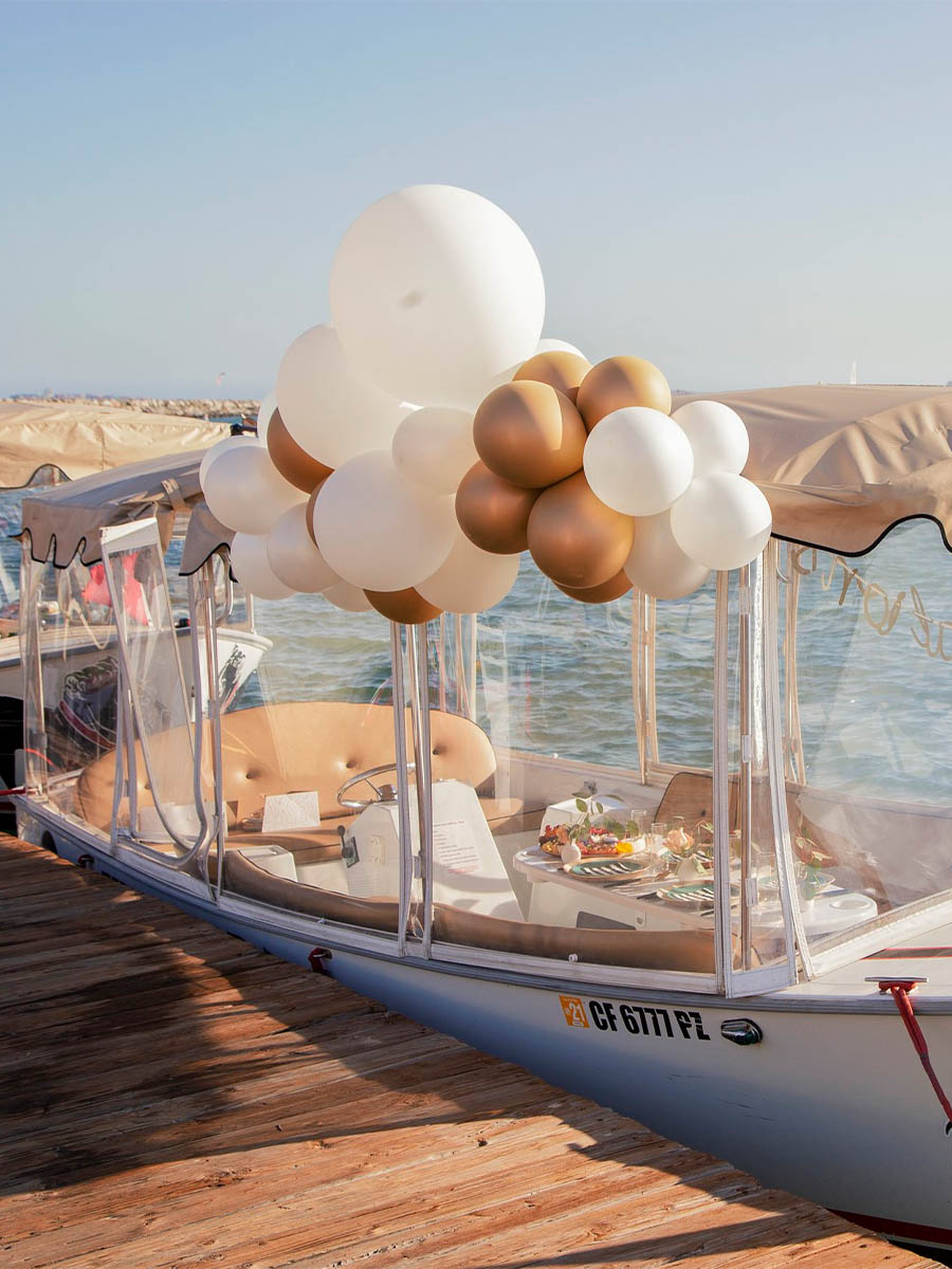 White and Gold Balloon Garland for Yacht Dining