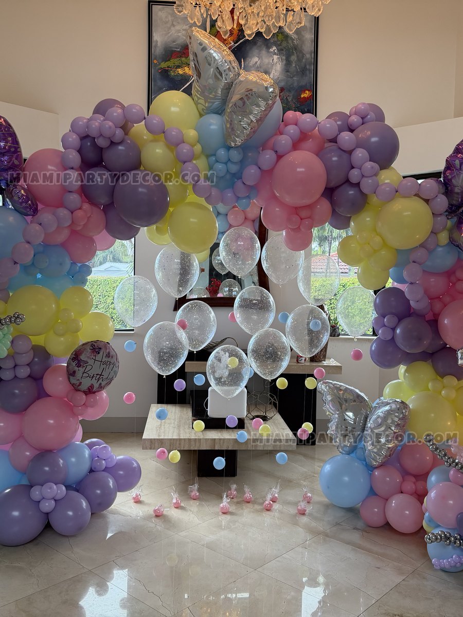 Pastel Balloon Display For A Fifteenth-Birthday Celebration