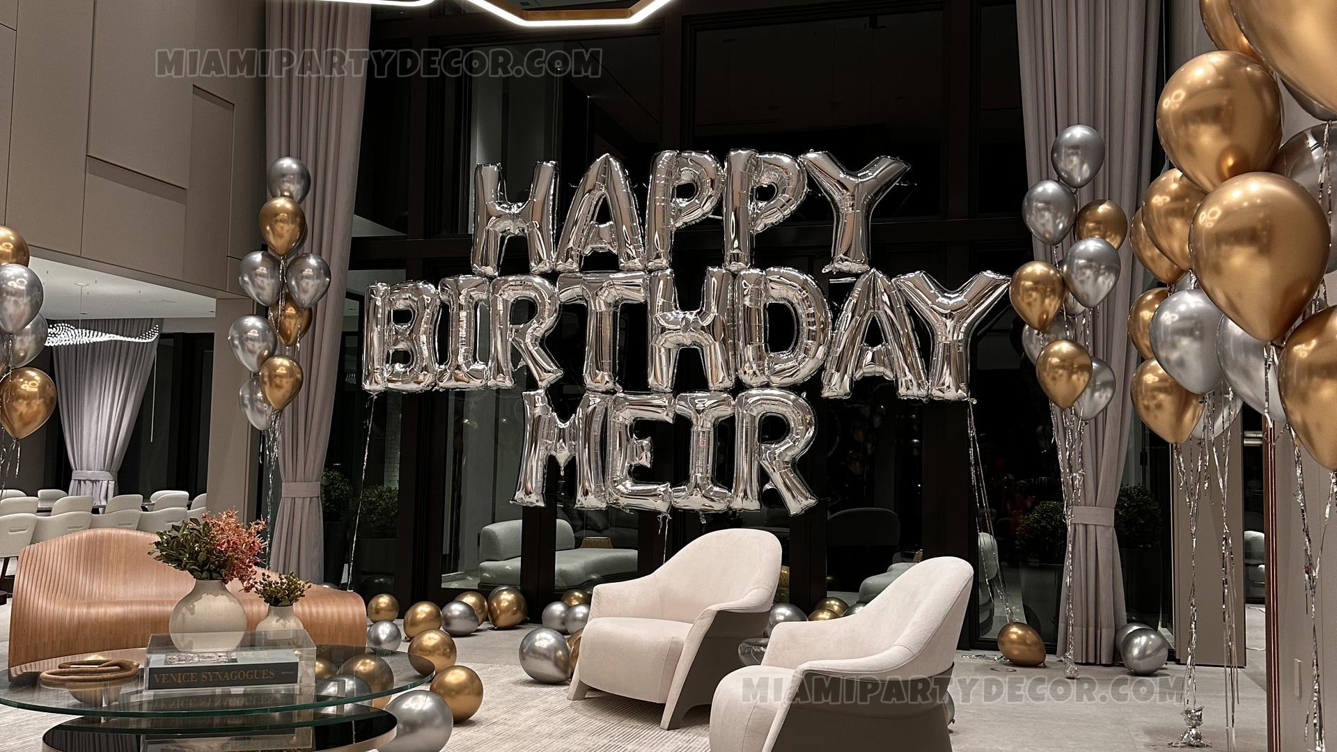 Silver Balloon Letters Reading Happy Birthday Meir In A Modern Room
