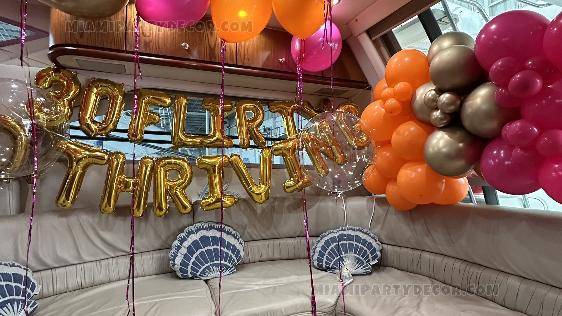 Colorful Thirtieth-Birthday Balloons Inside A Yacht Cabin
