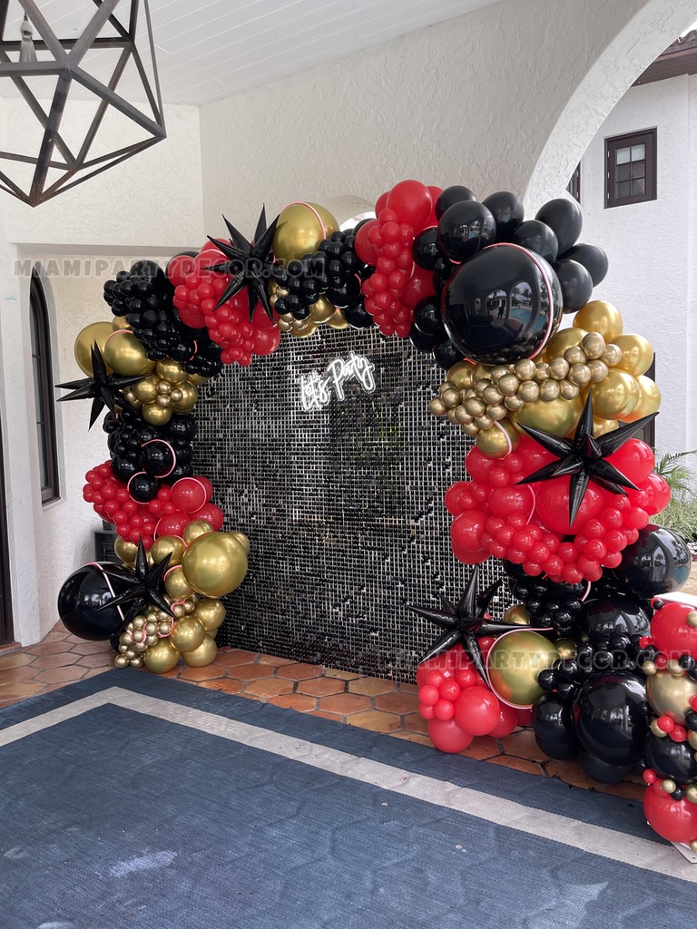 Black Shimmer Wall Backdrop with Red Gold Balloon Garland gallery image 2