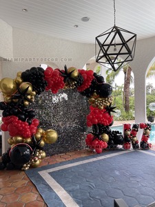 Black Shimmer Wall Backdrop with Red Gold Balloon Garland