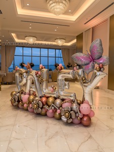 Custom Letter Balloon Sculpture with Floral Balloon Base gallery image 2