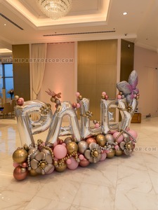 Custom Letter Balloon Sculpture with Floral Balloon Base gallery image 3