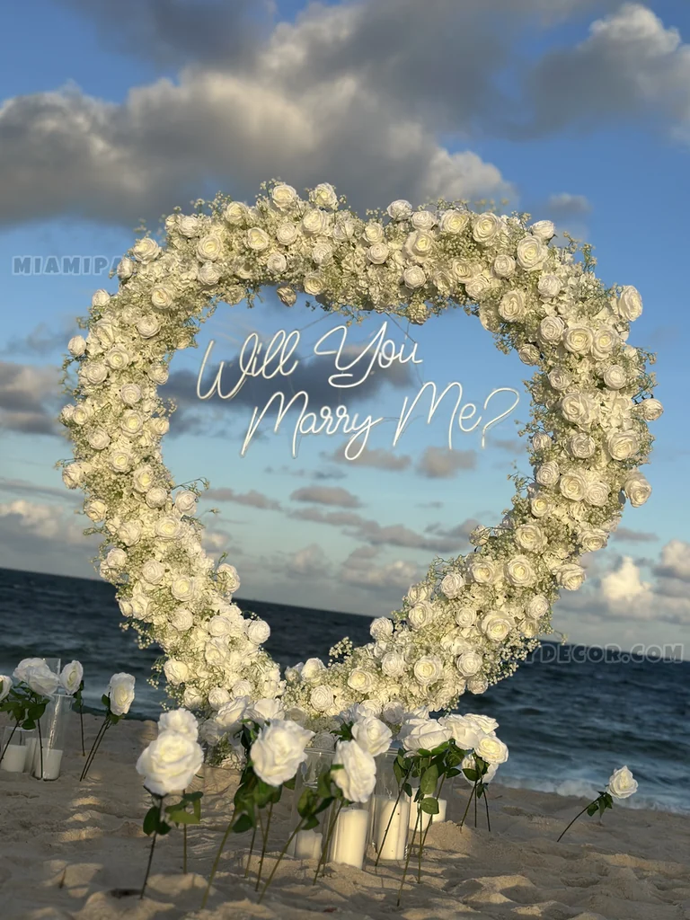Heart-Shaped White Flower Arch Proposal Setup gallery image 2