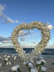Heart-Shaped White Flower Arch Proposal Setup gallery image 3