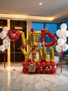Red and Gold Birthday Balloon Sculpture Setup