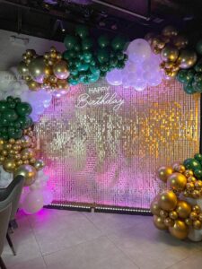 Shimmer Wall Birthday Backdrop in Miami | Green & Gold image 1
